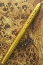Load image into Gallery viewer, Front view of the fountain pen with the cap on.

