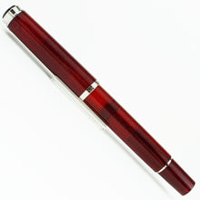 Load image into Gallery viewer, Back view of the fountain pen, capped. 
