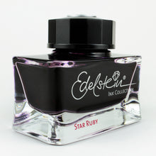 Load image into Gallery viewer, Angled front view of the Edelstein Star Ruby ink bottle. 
