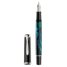 Load image into Gallery viewer, Front view of the fountain pen with the cap next to it.
