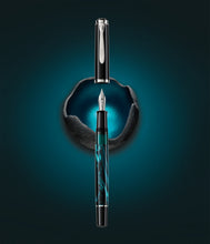 Load image into Gallery viewer, Front view of the fountain pen with the cap above it. 
