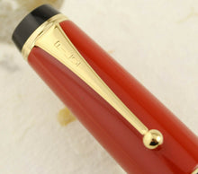 Load image into Gallery viewer, Close up to the cap&#39;s clip. It has the word PILOT engraved on it. 
