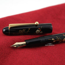 Load image into Gallery viewer, Side close up to the fountain pen nib, grip section, and cap.
