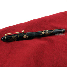 Load image into Gallery viewer, Side view of the fountain pen with the cap on.
