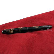 Load image into Gallery viewer, Back view of the fountain pen with the cap on. 
