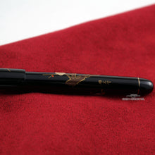 Load image into Gallery viewer, Close up to the tree branch and artist signature on the barrel: Kazuo Nihei
