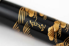Load image into Gallery viewer, Close up to the artist signature on the barrel. 
