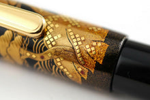 Load image into Gallery viewer, Close up to the gold pieces under the cap's clip.
