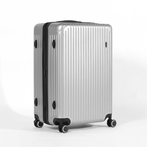 Angled front panel view of the silver colored suitcase. 