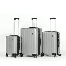 Load image into Gallery viewer, Three silver suitcases shown in their large, medium and small sizes on a white background
