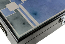 Load image into Gallery viewer, Close up to the top left corner of the box. It has two stains.
