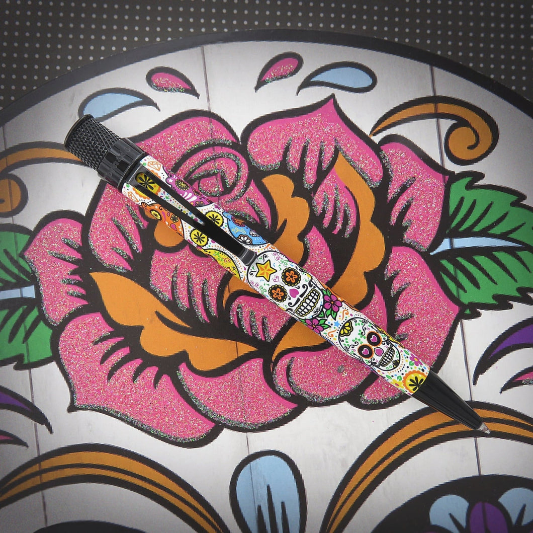 Front view of the pen on a decorated calavera background.