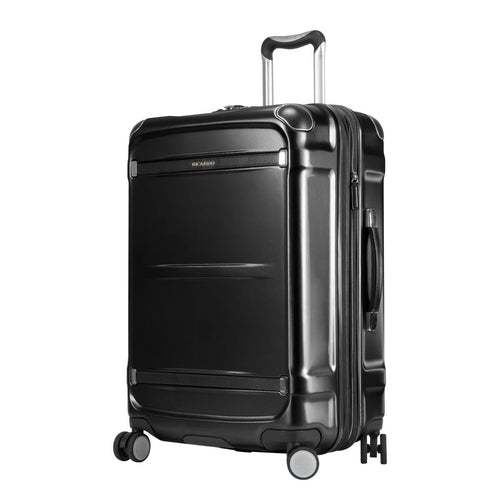 Angled front panel view of the black hard shell suitcase.