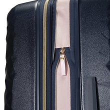Load image into Gallery viewer, Close up to the navy blue suitcase&#39;s expandable feature zipper. 
