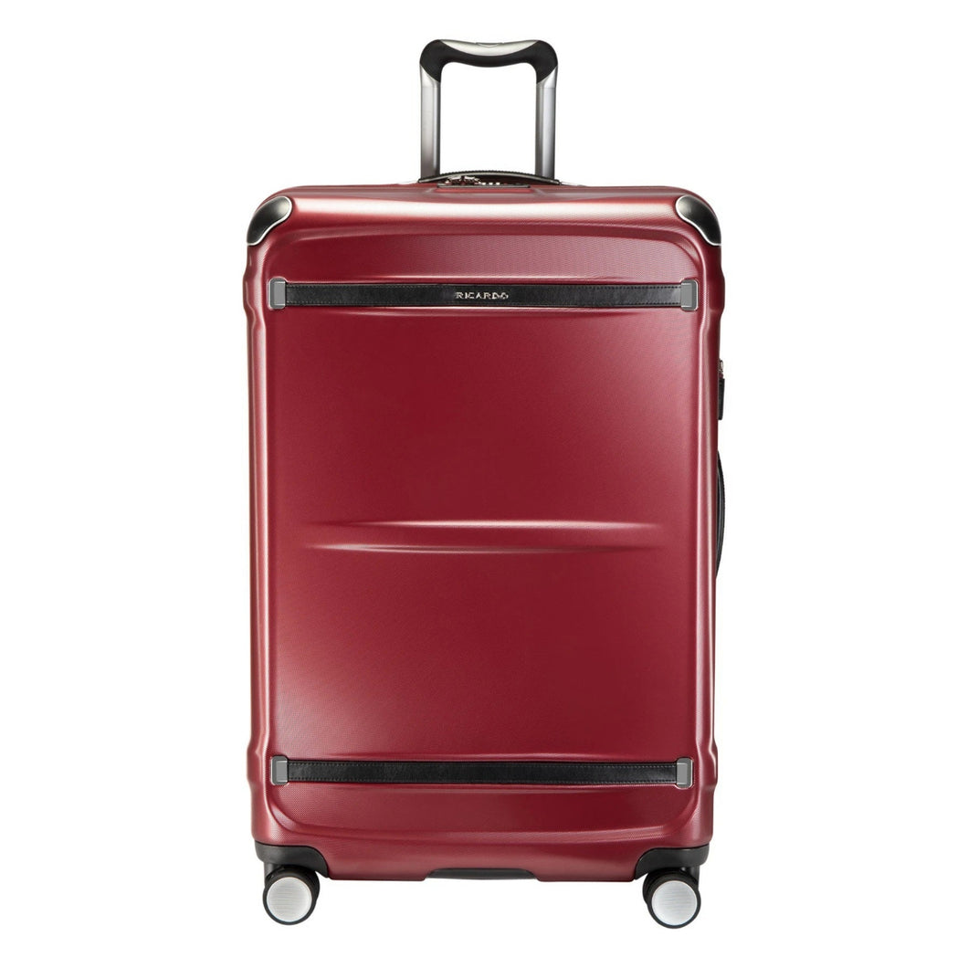 Front panel view of the red hard shell suitcase. 