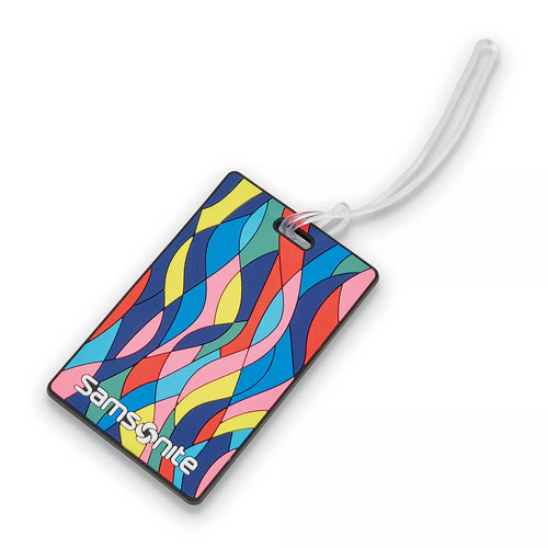 Back view of an ID tag with colorful shapes and the Samsonite logo. 