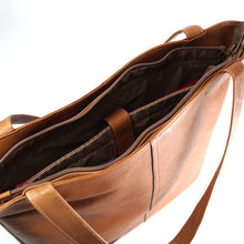 Load image into Gallery viewer, Interior view of the tan leather tote bag. 
