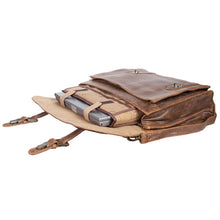 Load image into Gallery viewer, Angled view of the suitcase laid on its side. The laptop compartment is peeking from the main interior. 
