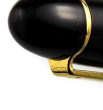 Load image into Gallery viewer, Close up to the top of the clip. A logo and the word Germany are engraved. 
