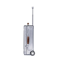Load image into Gallery viewer, Side panel view of the suitcase. 
