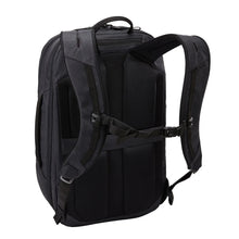 Load image into Gallery viewer, Angled back panel view of the black backpack, featuring the adjustable shoulder straps. 
