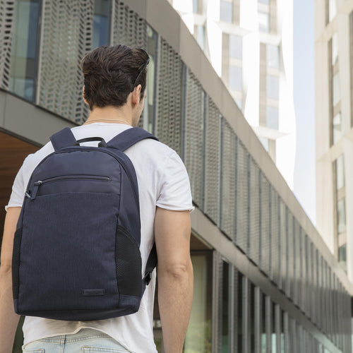 TRAVELON ANTI-THEFT METRO BACKPACK, BLUE WITH MODEL