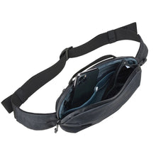 Load image into Gallery viewer, Interior view of the sling bag with a cellphone tucked inside a pocket.
