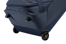 Load image into Gallery viewer, Thule Crossover 2 30&quot; Wheeled Duffel in Dress Blue, Bottom Angled View

