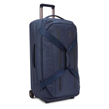 Load image into Gallery viewer, Thule Crossover 2 30&quot; Wheeled Duffel in Dress Blue, Front Angled View
