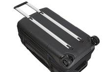 Load image into Gallery viewer, Back panel view of the suitcase laid on its front panel with the telescopic handle extended. 

