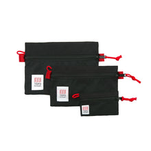 Load image into Gallery viewer, The three different black bag sizes for the accessory bags. 
