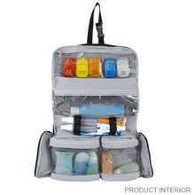 Load image into Gallery viewer, Travelon Flat Out Toiletry Kit, Blue Unzipped
