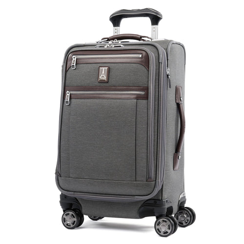 Angled front panel view of the suitcase with the telescopic handle partly extended. 