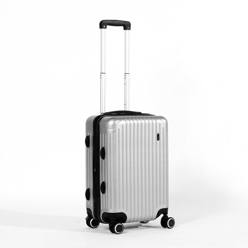 Angled front panel view of the silver colored suitcase with the telescopic handle partly extended. 