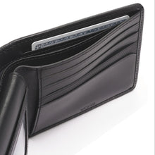 Load image into Gallery viewer, Interior view of the wallet showing the billfold compartment and credit card compartments on the right side. 
