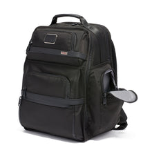 Load image into Gallery viewer, Angled front panel view of the backpack with the side pocket unzipped. 
