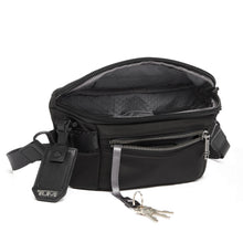 Load image into Gallery viewer, Angled front panel view of the waist pack with the main compartment unzipped. The front pocket is opened with the key leash pulled out.
