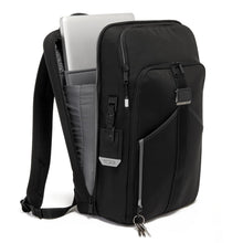 Load image into Gallery viewer, Angled front panel view of the backpack with the main compartment unzipped. A laptop is peeking through from its pocket.
