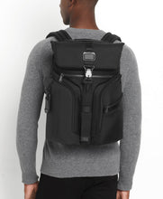Load image into Gallery viewer, A young man carrying the backpack on his back.

