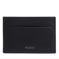 Front panel view of the money card case. A small Tumi logo is visible at the center bottom and two card slots are available. 