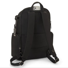 Load image into Gallery viewer, Angled back panel view showing a phone peeking from the pocket under the grab handle 
