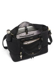 Load image into Gallery viewer, Angled interior view of the top zipper, featuring a laptop compartment and a water bottle on the side pocket (Bottle not included).
