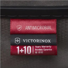 Load image into Gallery viewer, Close up to the interior tags: One for the antimicrobial feature, then the Victorinox logo, then the 1+10 Years Warranty. 
