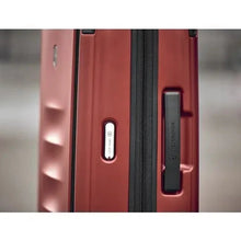 Load image into Gallery viewer, Close up to the side panel of the suitcase. It features a grab handle. 
