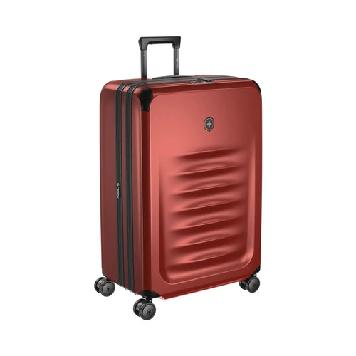 Angled front view of the suitcase with the telescopic handle partly extended.