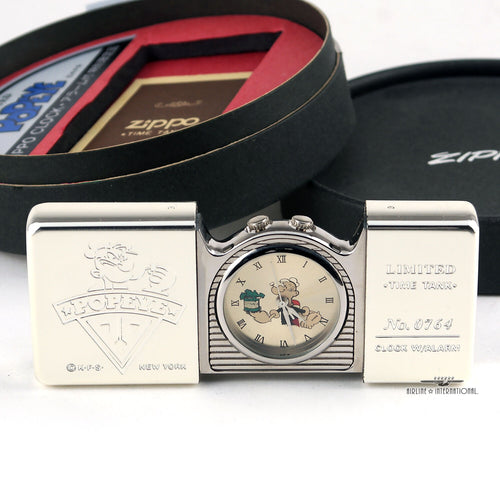 The open Zippo Limited Edition Popeye Travel Clock shows Popeye with a spinach can, the clock reads 