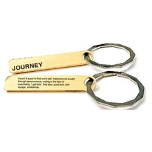Load image into Gallery viewer, A rectangular brass colored key chain on a key ring with the word JOURNEY. The back definition reads: (noun) quest to find one&#39;s self. Improvement sought through perseverance. Saying in the face of uncertainty: &quot;I got this&quot;. See also: good luck, bon voyage, confidence. 

