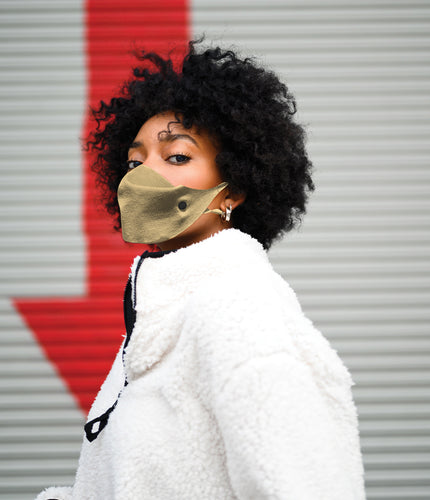 Stock Image of a young Model using the light brown mask.